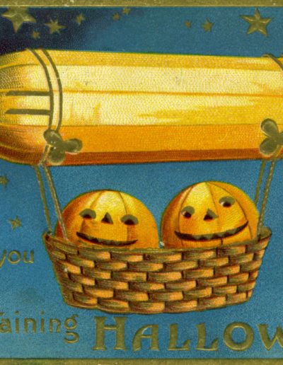 Two jack-o-lanterns in floating basket