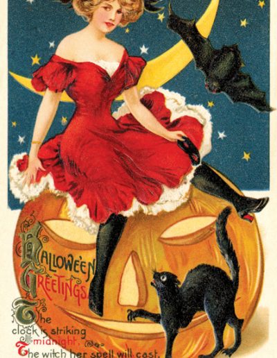Woman in red dress on pumpkin